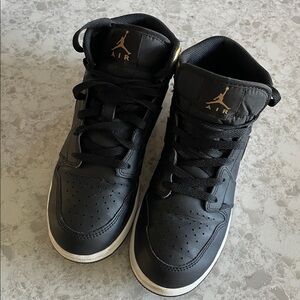 Air Jordan Black and Gold Sneakers